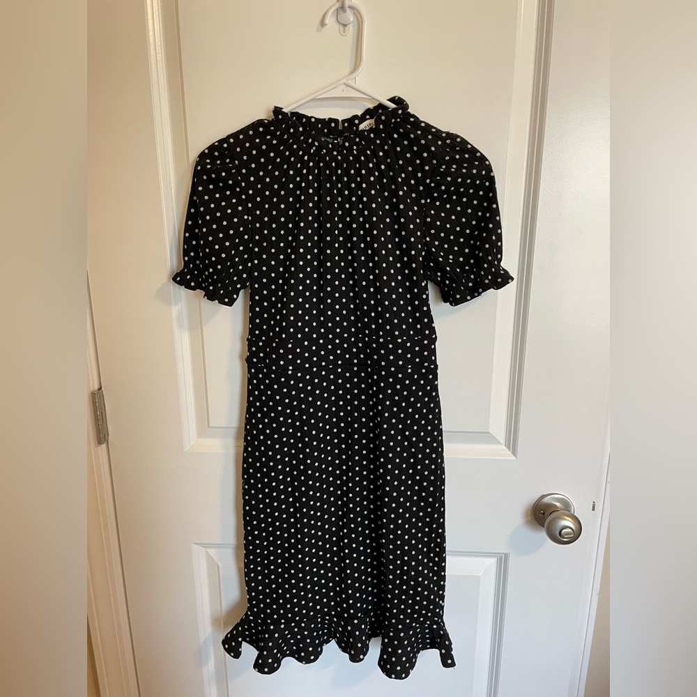 Polka dot dress, ruffle trim, button on back of the neck, keyhole back